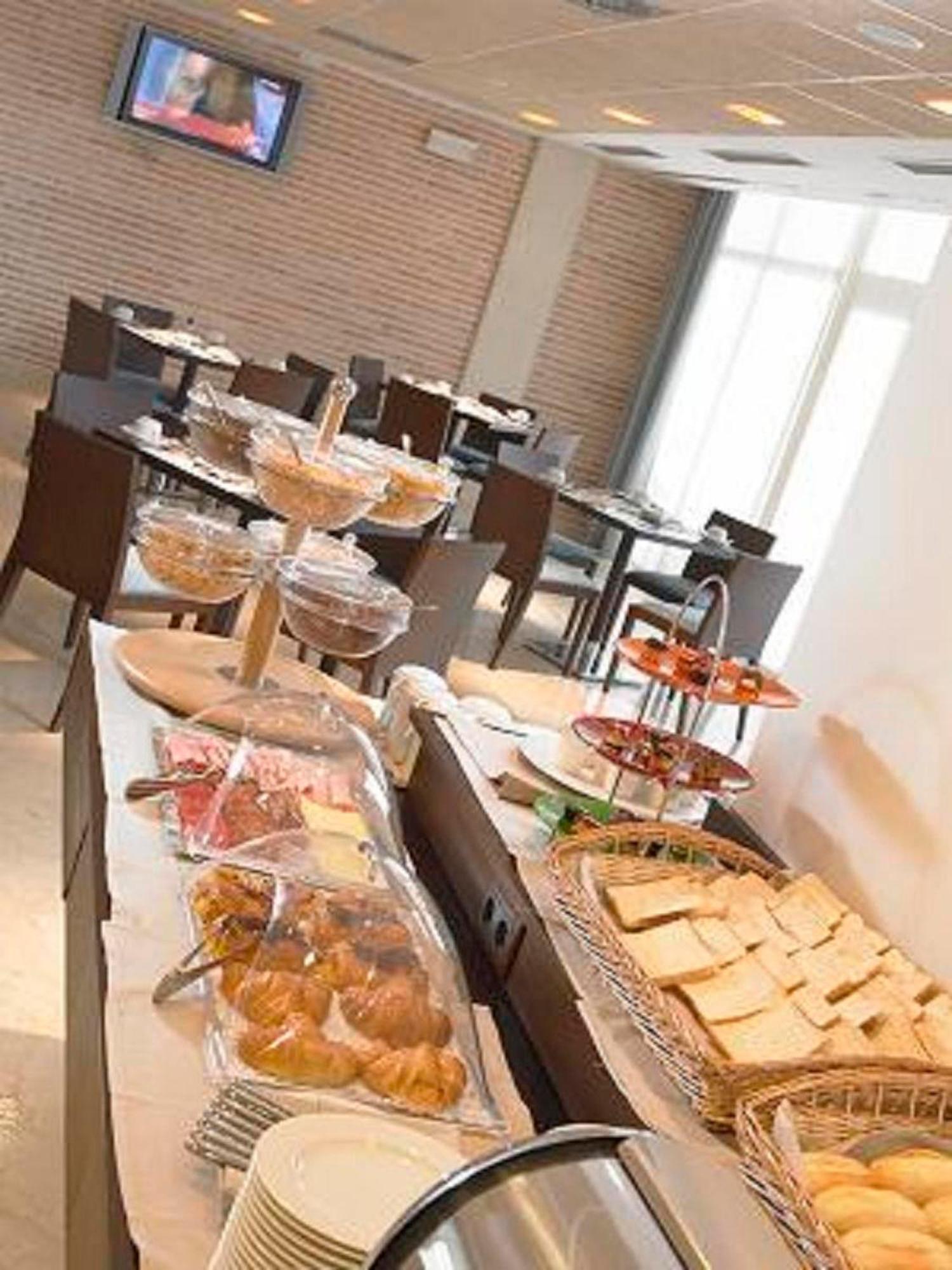 Hotel Isla de La Garena Alcala de Henares Restoran foto